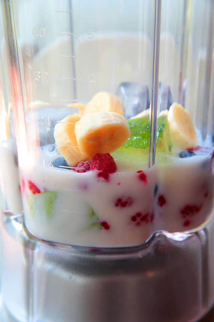 Fruit and milk in blender- smoothie